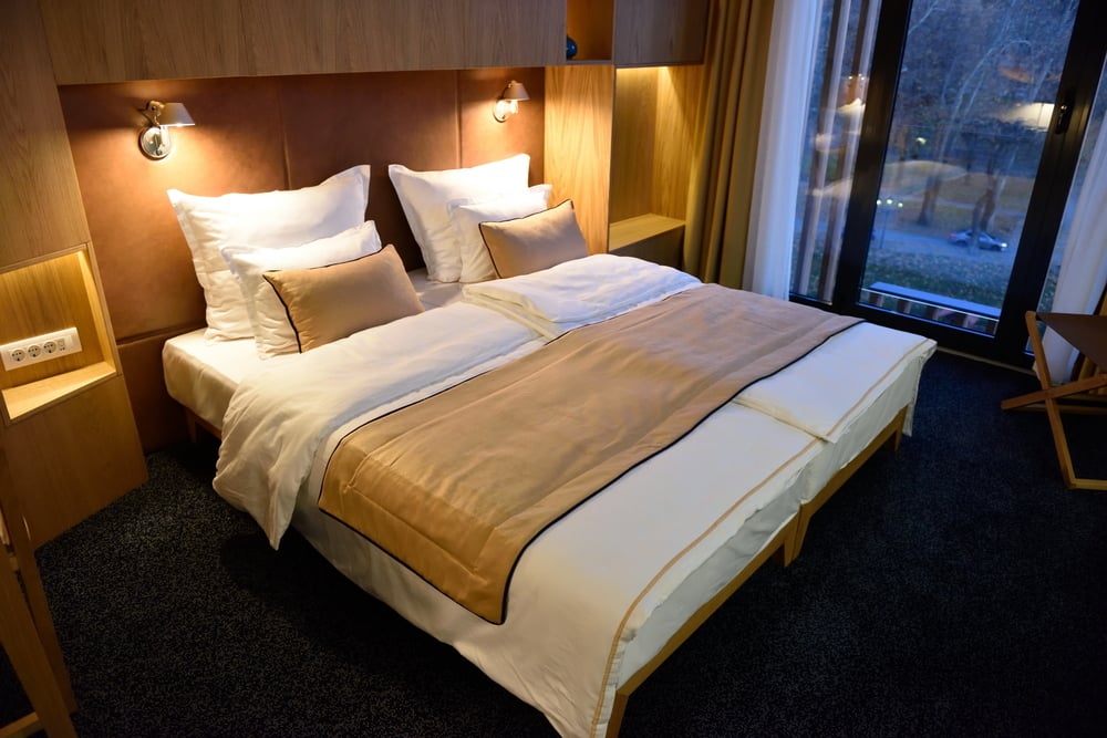 Interior of modern comfortable hotel room-1